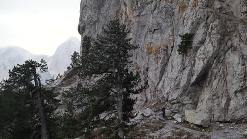Hiking from the famous Valbona to Theth valley. Valbone to Thethi in the Albanian Alps. Man backpack