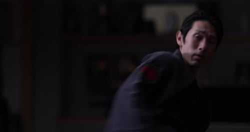 Japanese male practicing Karate in Dojo in Tokyo, Japan
