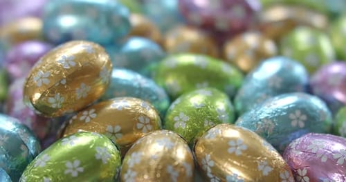 Close-up of Easter eggs wrapped in shiny foil