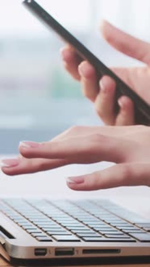 Typing on Laptop, Using Mobile Phone Simultaneously