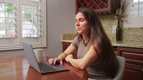 Woman feeling overwhelmed from remote job