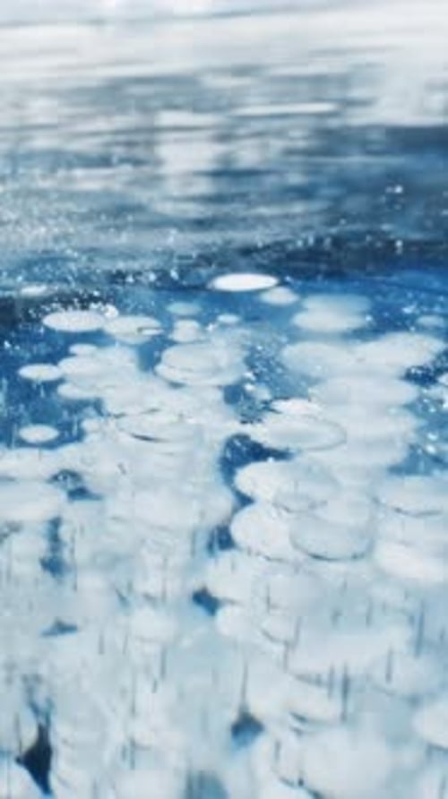 Blue ice and frozen bubbles on Baikal