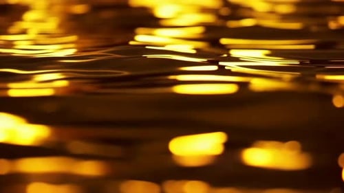 Golden Liquid Ripples abstrakter schimmernder Hintergrund