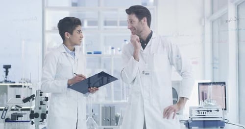 Scientists Collaborating in a Bright Modern Laboratory