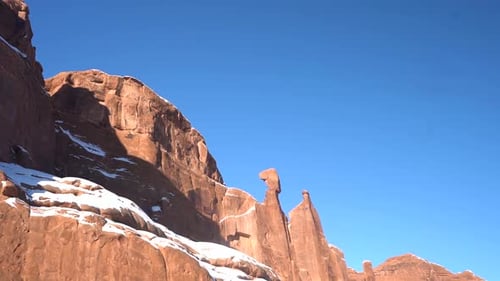 Arches National Park Utah USA on Sunny Winter Day. Sandstone Rocks Covered With Snow, Panorama