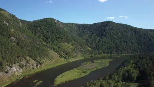 Awesome aerial view of scenic river among mountains