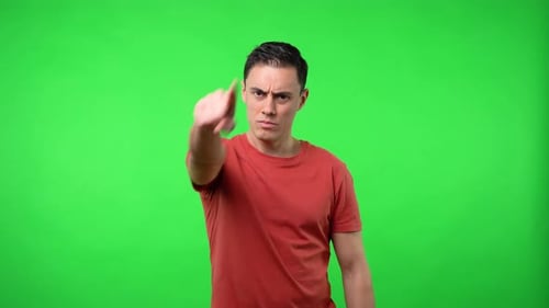 Man Looking at you Seriously and Pointing His Finger at you