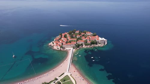 Drone Shot of Sveti Stefan Island Resort in Montenegro, Small Island With Stone Houses