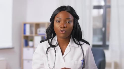 Doctor Explaining Medical Advice with Hand Gesture