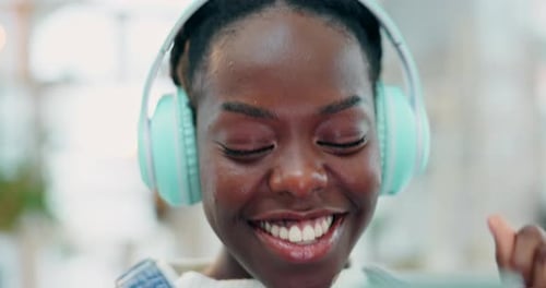 Phone, music and happy face of black woman dance, listening streaming sound track