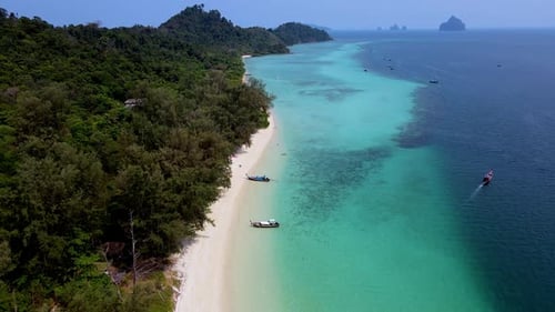 Stunning Koh Kradan Thailand Beach Retreat with Crystal Clear Waters and Lush Greenery
