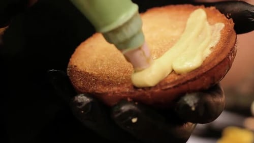 Chef Making Delicious Burger Close Up