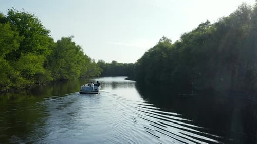 Fly By The Sailing Motorboat On Peaceful Lake Near Waterstaete In Ossenzijl, Friesland, Netherland.