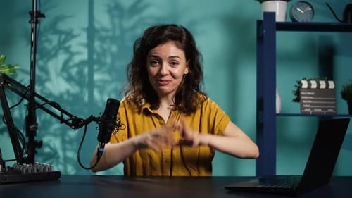 Young Adult Woman Vlogging into her Camera