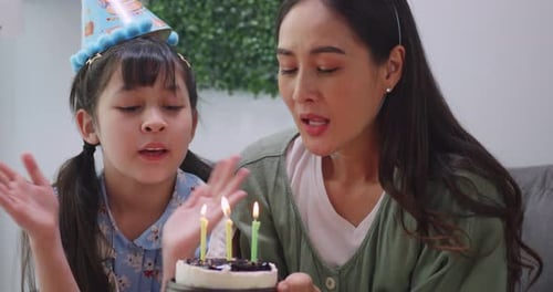 Mother and Child Celebrating Birthday at Home