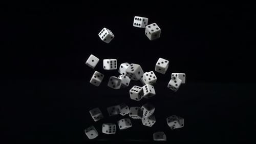 Dice tumbling downward in super slow motion shot with phantom camera