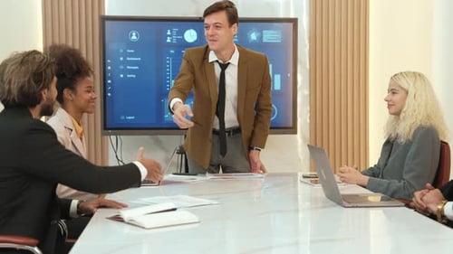 Business Team Meeting in Modern Conference Room