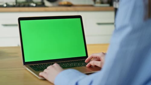 Freelancer Typing Greenscreen Laptop at Home Office Closeup Unknown Woman Hands