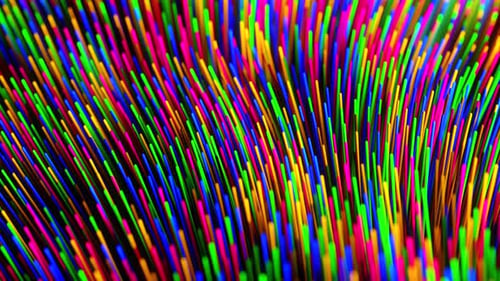 Close up of colorful object with many lines of color on it. Loop animation
