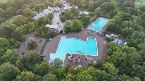 Aerial view of public pools surrounded by greenery, Germany.