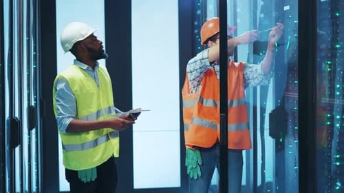 Skilled Workers Install a Modern Elevator in a Hightech Building Ensuring Safety and Efficiency