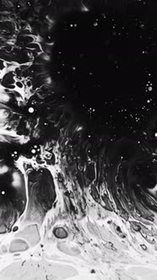 Abstract Black Ink Flowing Down White Background