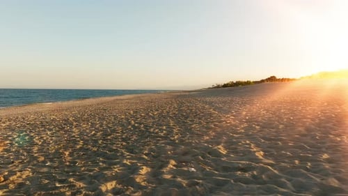Sandy Beach at Sunset Light