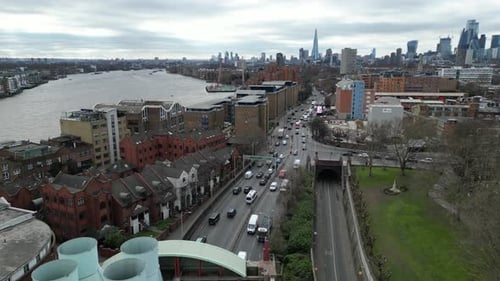 Dramatic Aerial View of London City Traffic and Shard Skyline