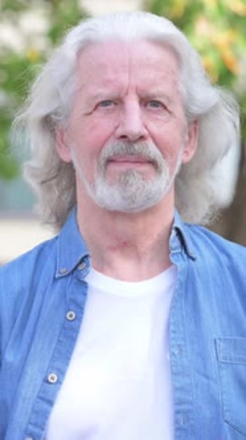 Senior man with gray hair in casual clothing