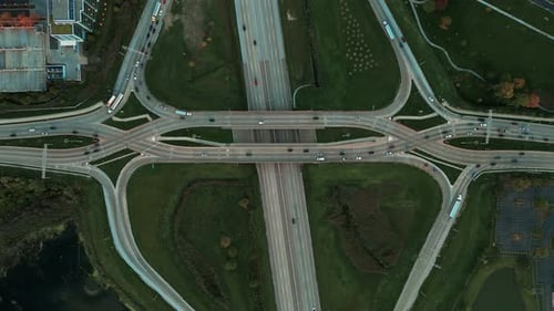 Famous Road Intersection with Traffic on Multiple Flyovers in the Evening Drone Wide Shot