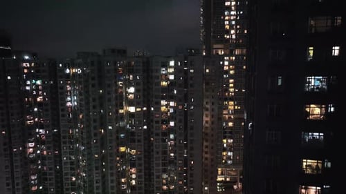 Windows Of Residential Buildings In Hong Kong At Night