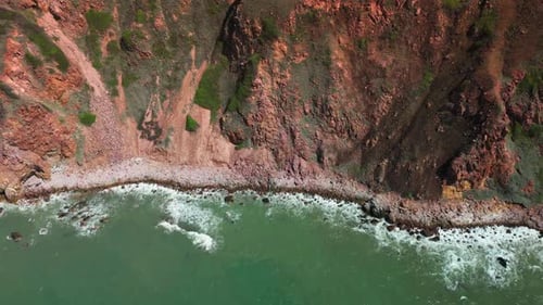 Foamy Sea Waves Crashing at Rocky Pebbled Seashore Slow Motion Scenic Marine Nature Concept Sea