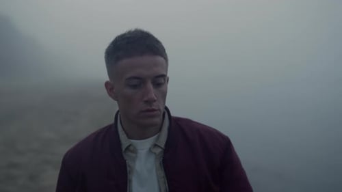 Portrait of Depressed Man Looking Ocean Horizon in Morning Mist. Closeup Serious
