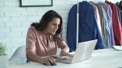 Upset, Frustrated Businesswoman Multitasking in Office,