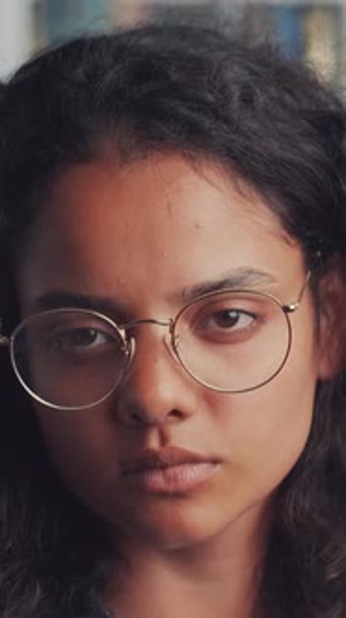 Portrait of Young Adult Woman Wearing Glasses