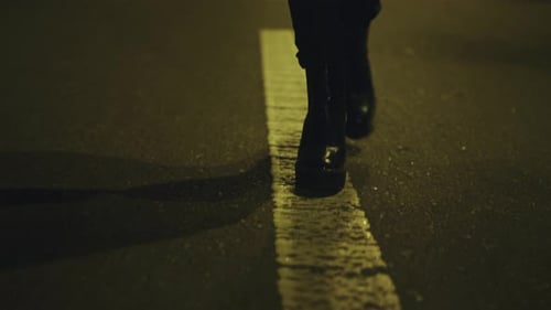 Slim Female Legs Going on Road in City Centre. Uknown Woman Walking