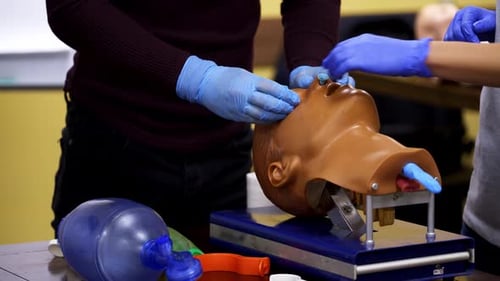 Medical Training with Mannequin in Classroom