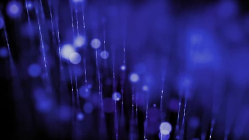 Dark Blue Glowing Particles Bokeh Effect Loop