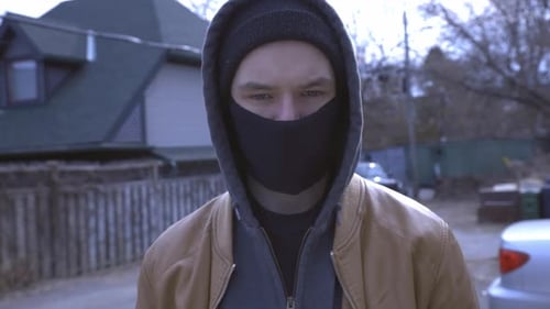 Man In The Street Wearing Facemask Looking At The Camera. Prevention For Coronavirus And Pollution.
