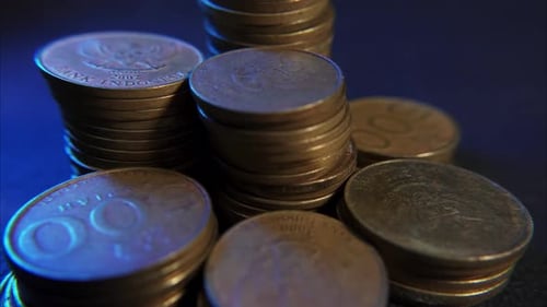 Bronze Coins Stacked in Studio Close Up
