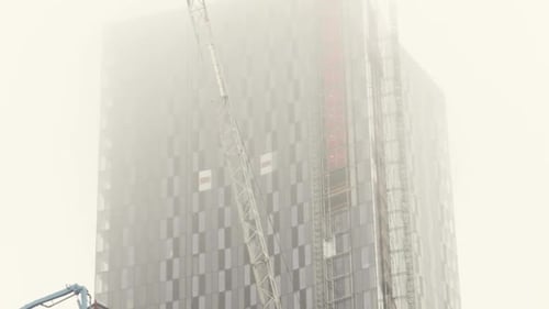 Construction Tower in Thick Mist