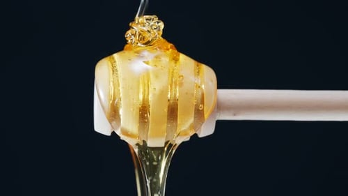 Liquid Honey And Honey Dipper