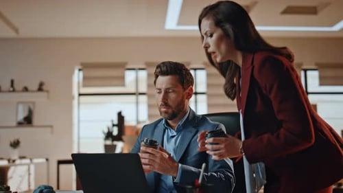 Woman Bringing Coffee Colleague Working Together in Office Coworkers Talking