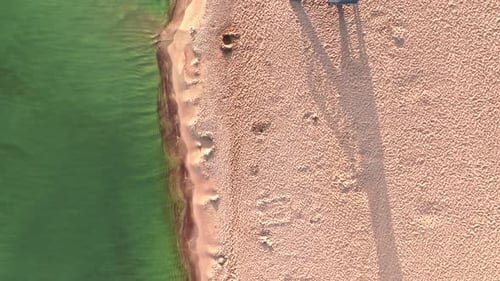 Top down view of lifeguard tower on beach in summer