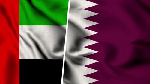 Waving Flags of United Arab Emirates and Qatar