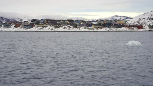 Ocean Towards Snowy Coastline of Greenland