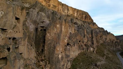 Cave Dwellings Carved into Cliffside Wall