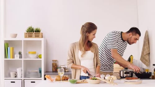 Couple Cooking Together in Bright, Modern Kitchen