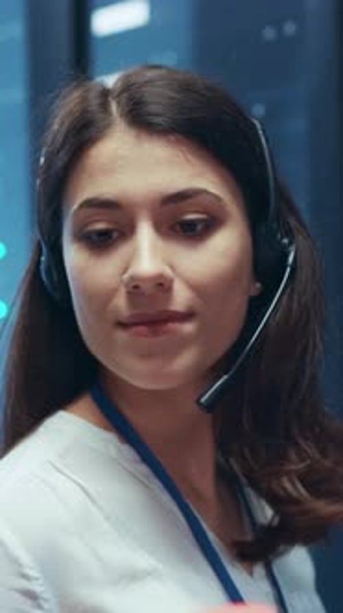 Dedicated Call Center Agent Using a Headset to Deliver Exceptional Customer Service