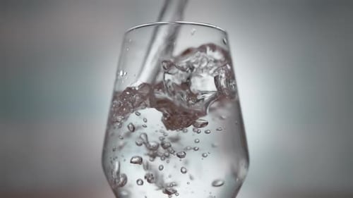 Glass Filled with Sparkling Water Bubbles